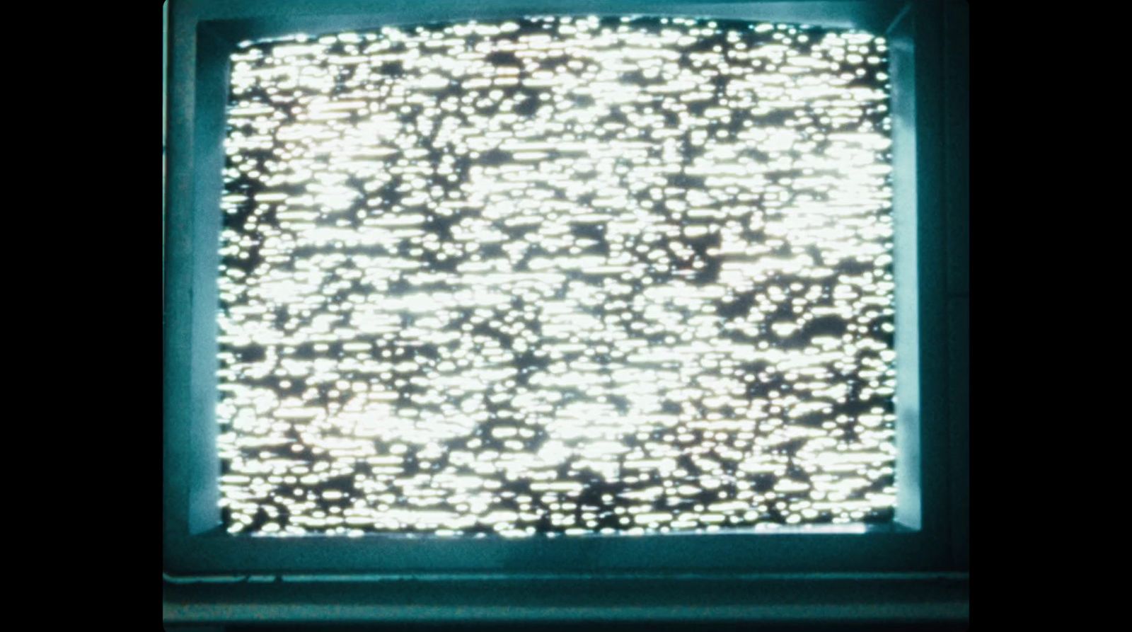 a television screen with a lot of white lights on it