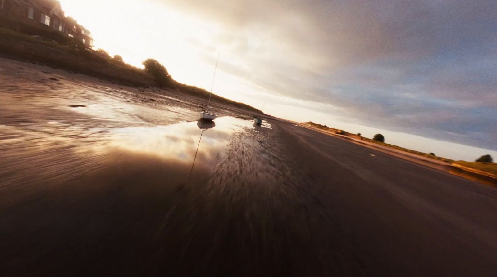 a person riding a surfboard on a body of water