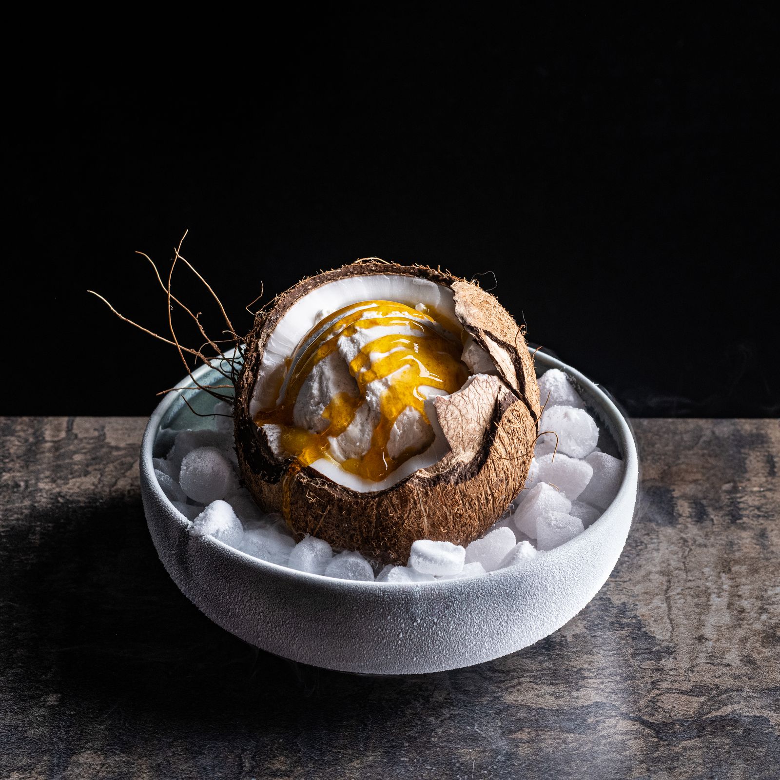 a bowl filled with ice and some kind of food
