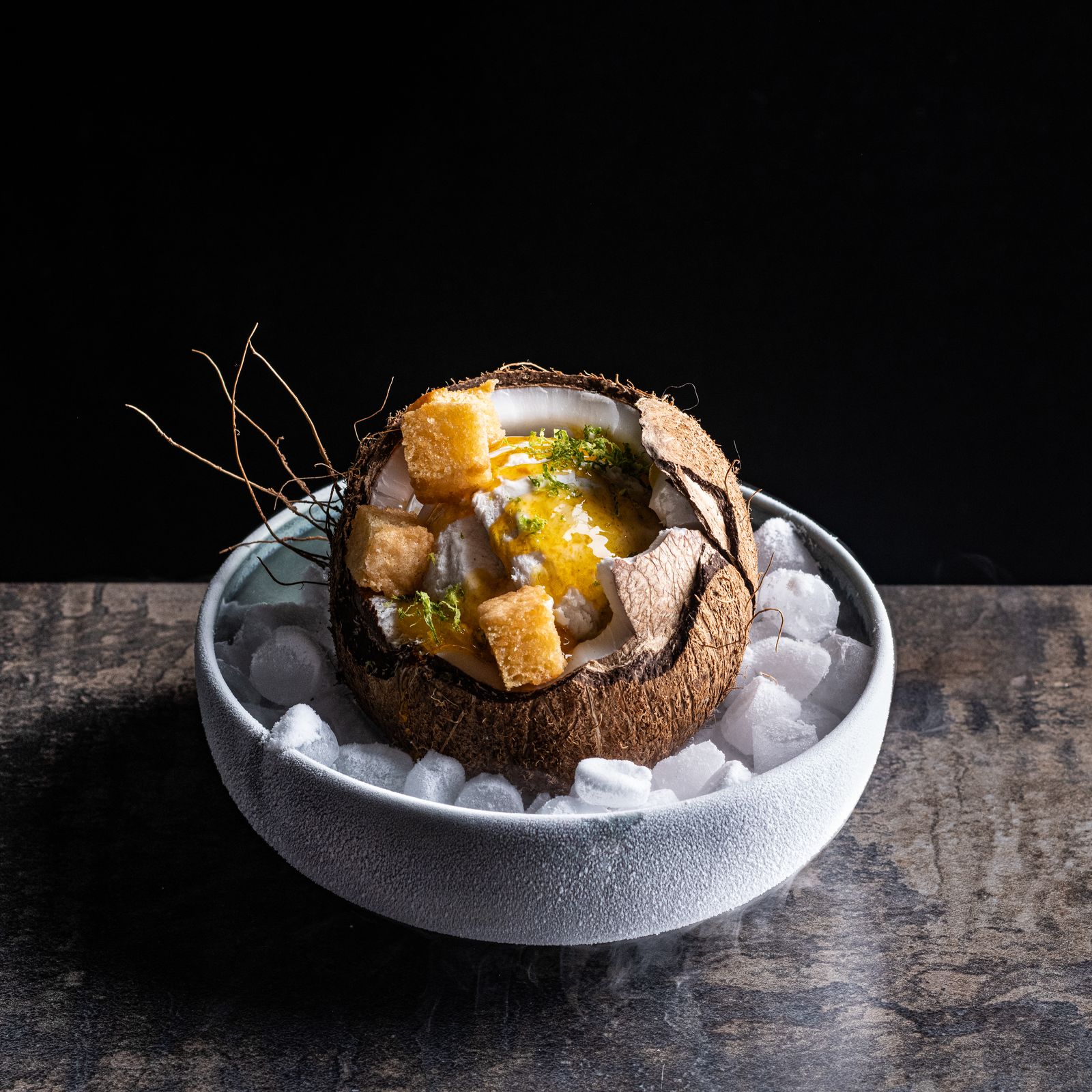 a bowl of food that is on a table