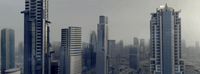 a group of tall buildings in a city