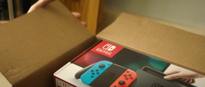 a box with a nintendo switch sitting on top of it