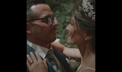 a man and a woman standing next to each other