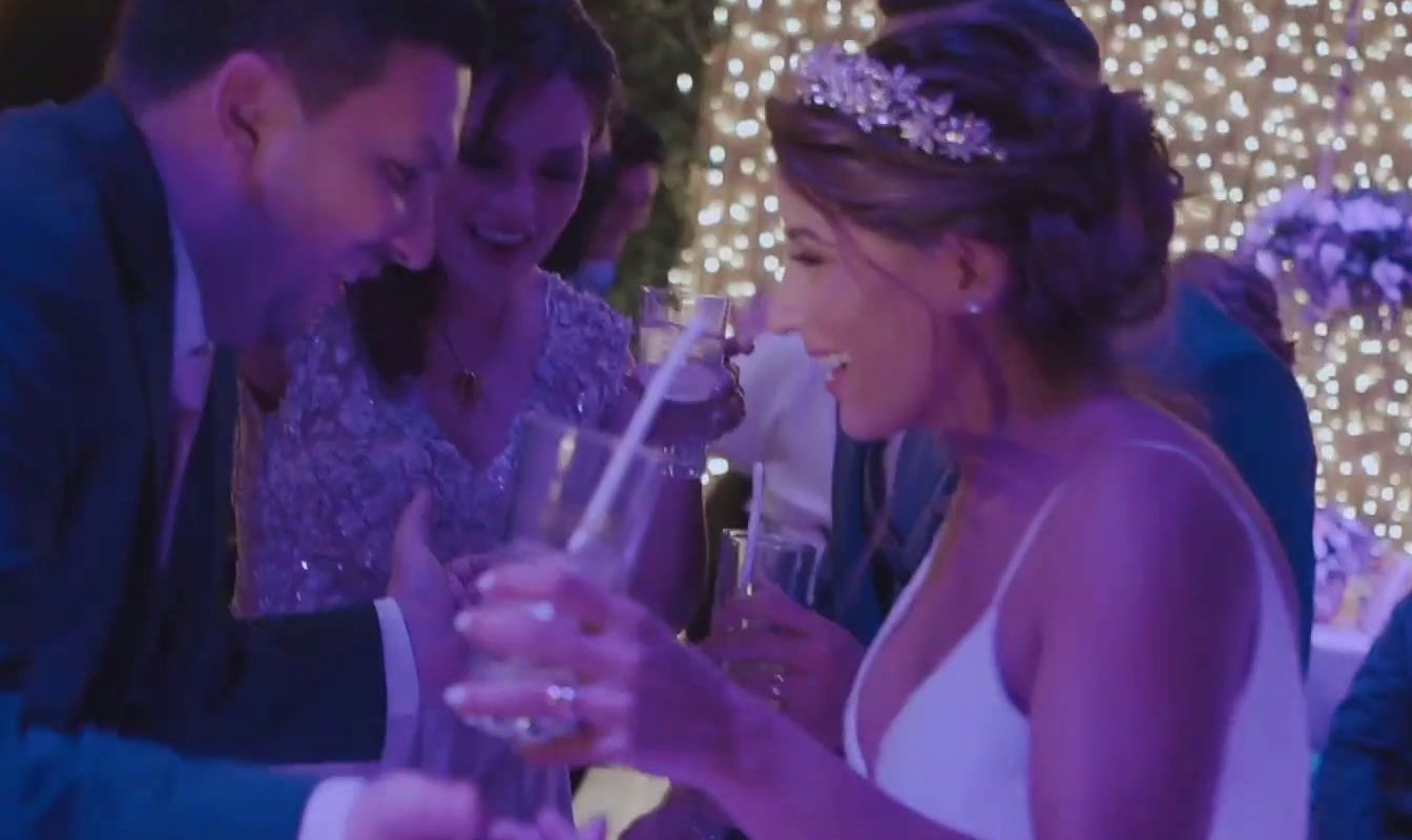 a man and a woman holding champagne flutes