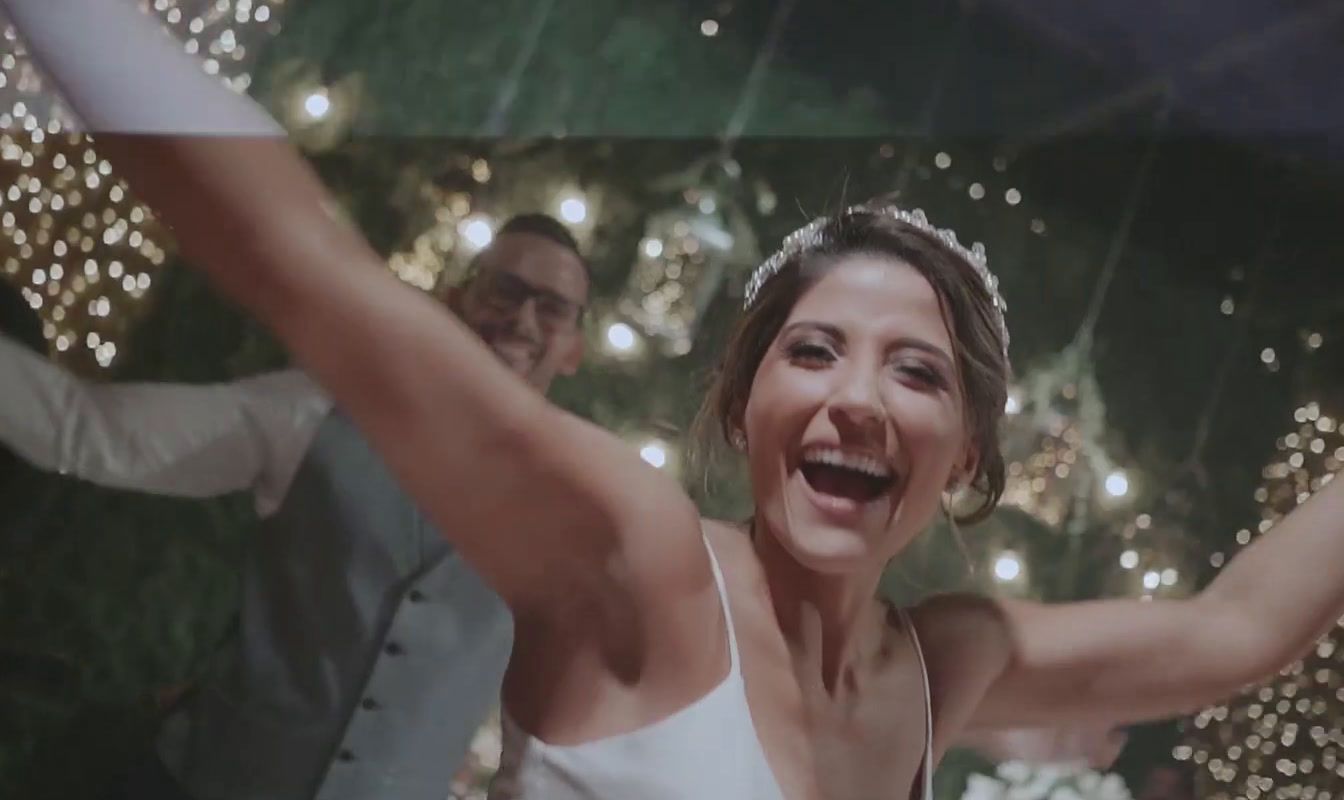 a woman in a white dress and a man in a suit