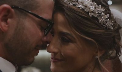 a close up of a bride and groom