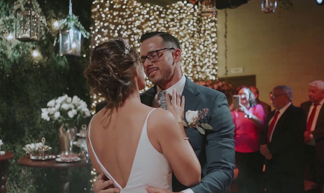 a bride and groom sharing a first dance