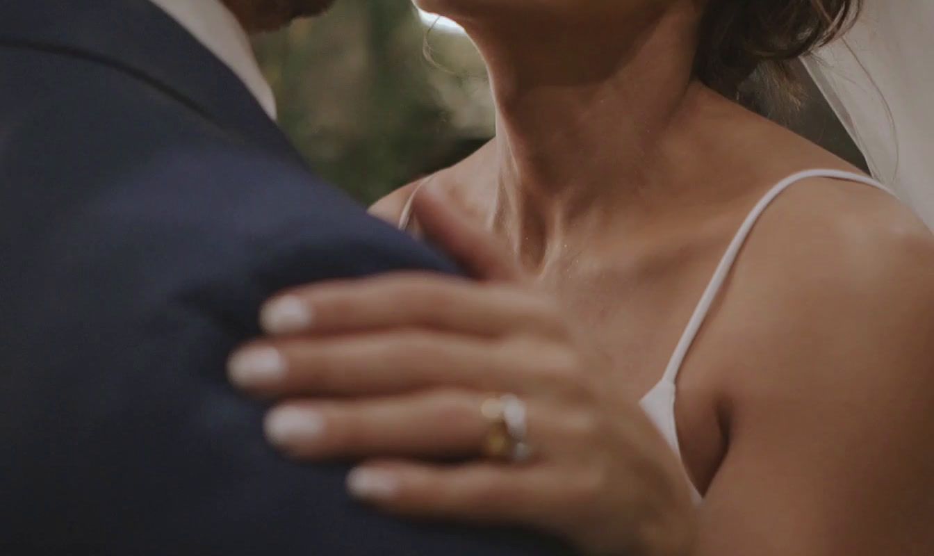 a woman in a wedding dress and a man in a suit