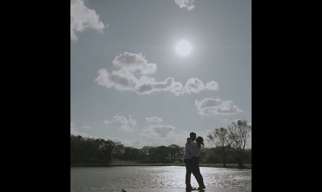 a man riding a skateboard on top of a lake