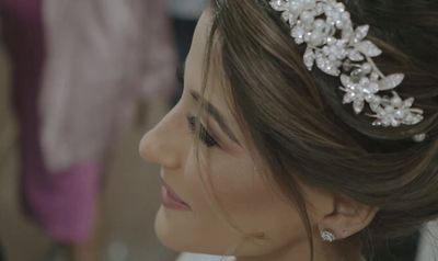 a close up of a woman wearing a tiara