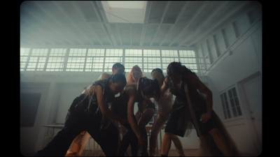 a group of women standing next to each other