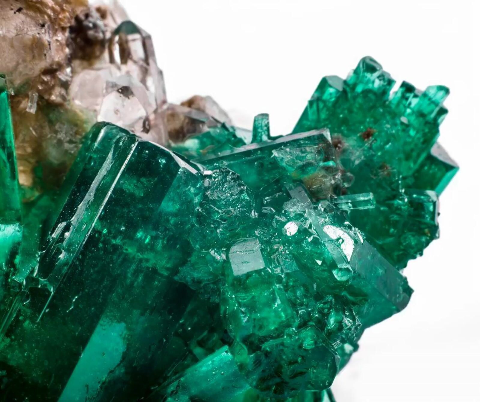 a cluster of green crystals sitting on top of each other