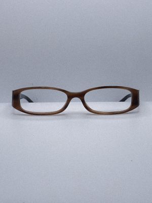 a pair of glasses sitting on top of a table