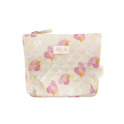 a pink and yellow purse with pink flowers on it