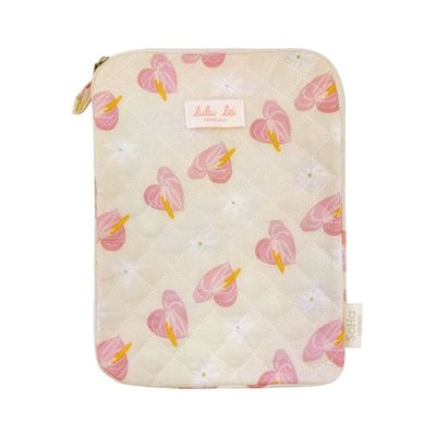 a pink and yellow ipad case with pink flamingos on it