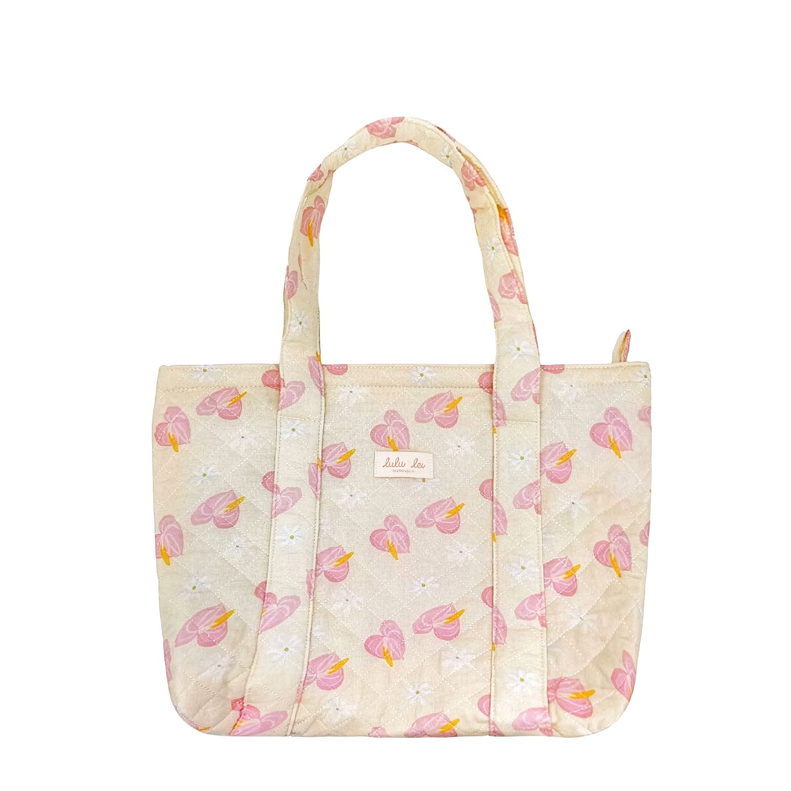 a white bag with pink butterflies on it