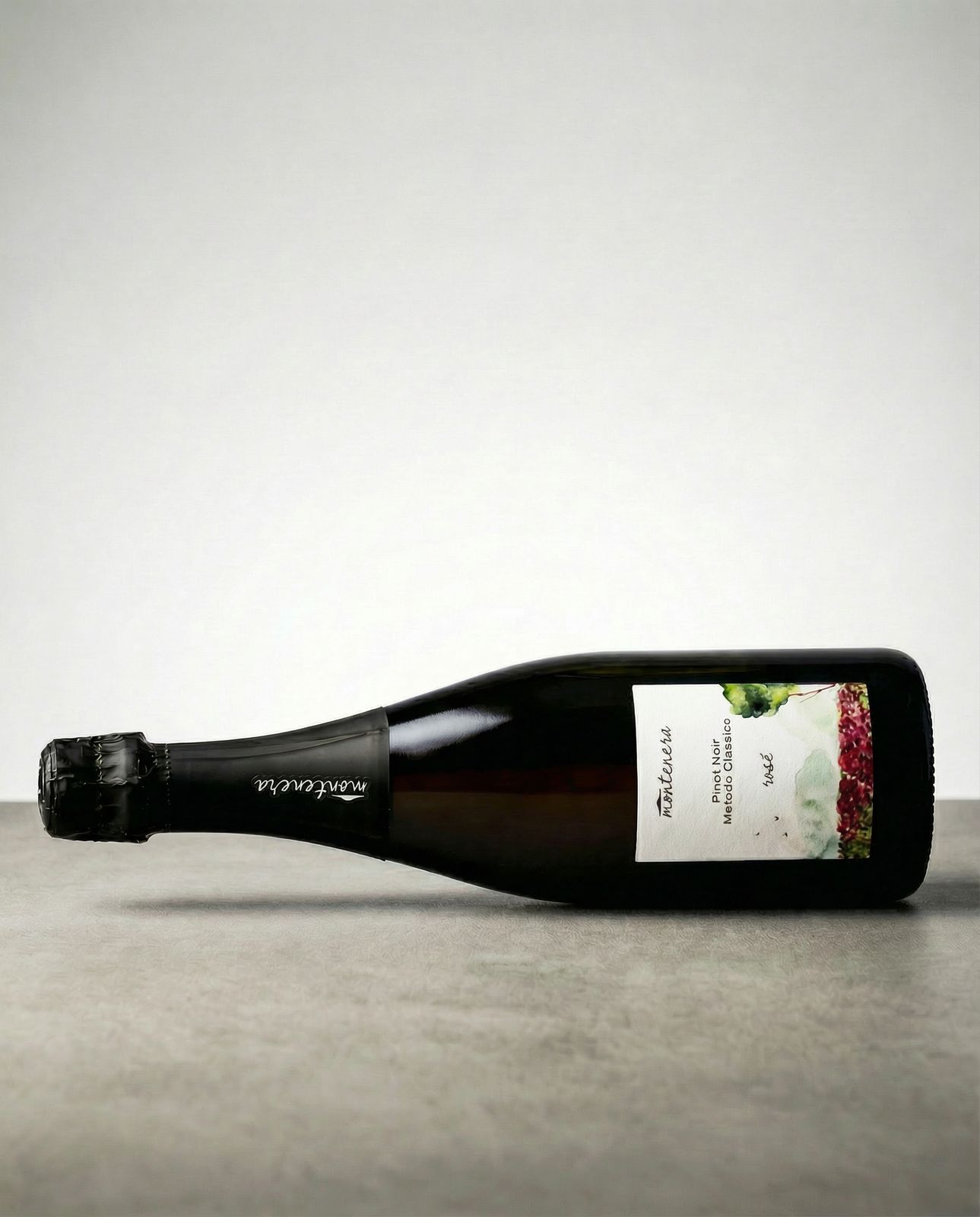 a bottle of wine sitting on top of a table