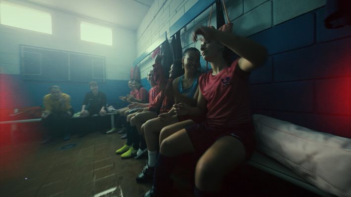 a group of people sitting in a room