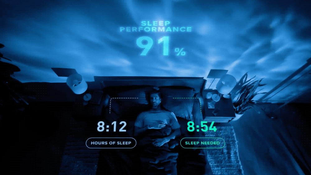 a man standing in front of a projection screen