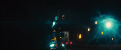 a blurry image of a traffic light at night