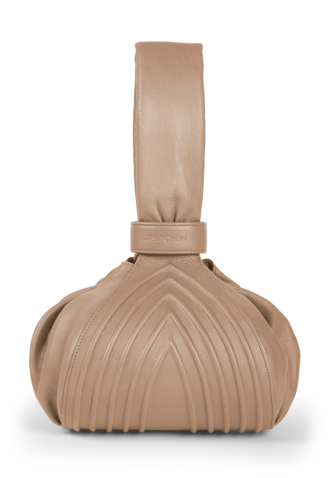 a tan handbag on a white background