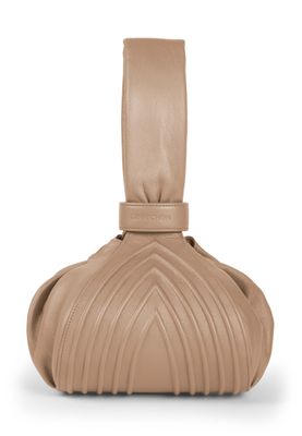 a tan handbag on a white background