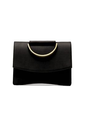 a black purse with a gold ring on it