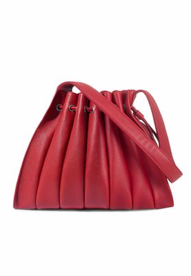 a red handbag on a white background