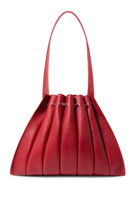 a red handbag on a white background