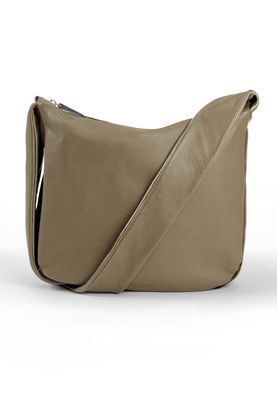 a beige leather bag on a white background