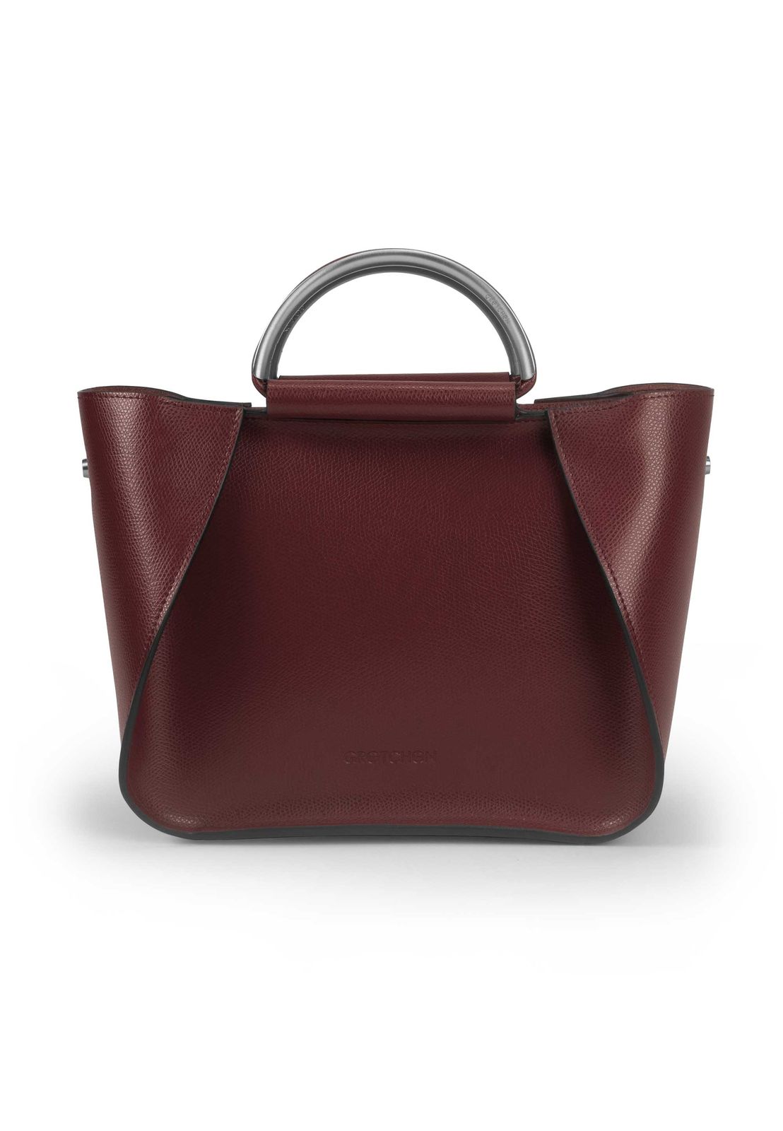 a red handbag with a metal handle