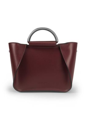 a red handbag with a metal handle