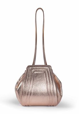 a metallic purse on a white background