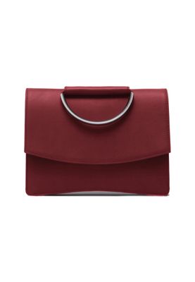 a red purse with a metal handle on a white background