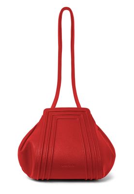 a red handbag on a white background