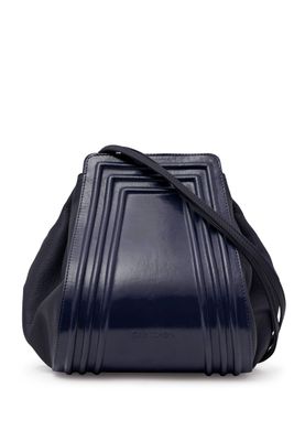 a blue handbag on a white background