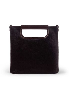 a black purse with a handle on a white background