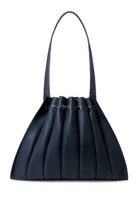 a blue handbag on a white background