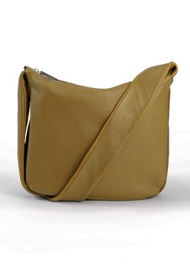 a tan leather bag with a cross - body strap