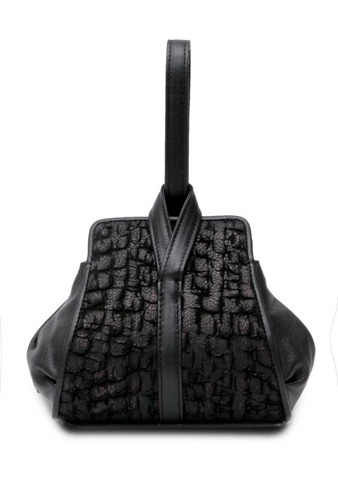 a black purse sitting on top of a white surface