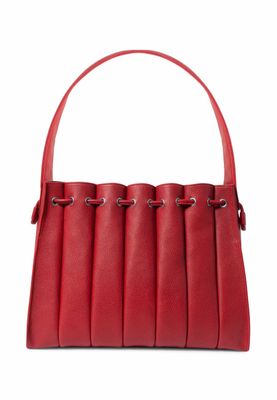 a red handbag on a white background