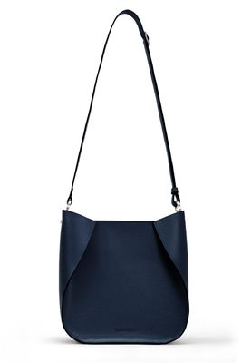 a blue purse with a black strap