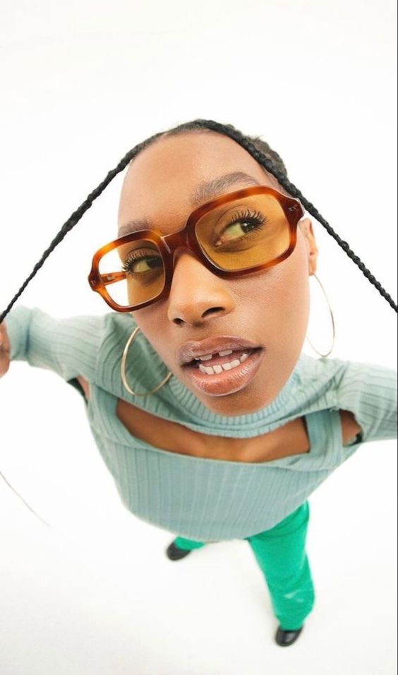 a woman with glasses on top of her head