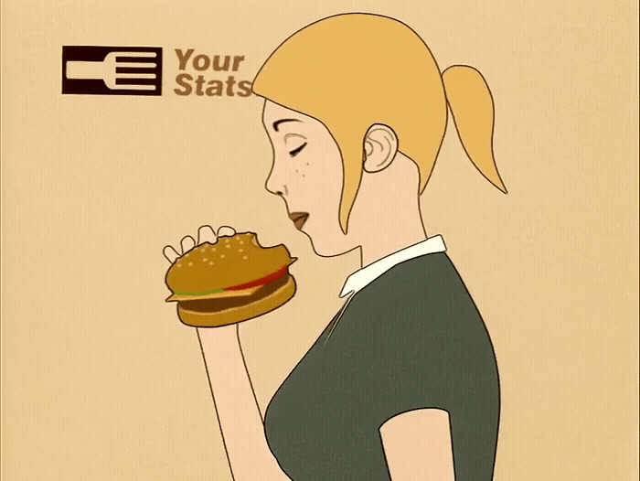 a woman eating a hamburger with her hand