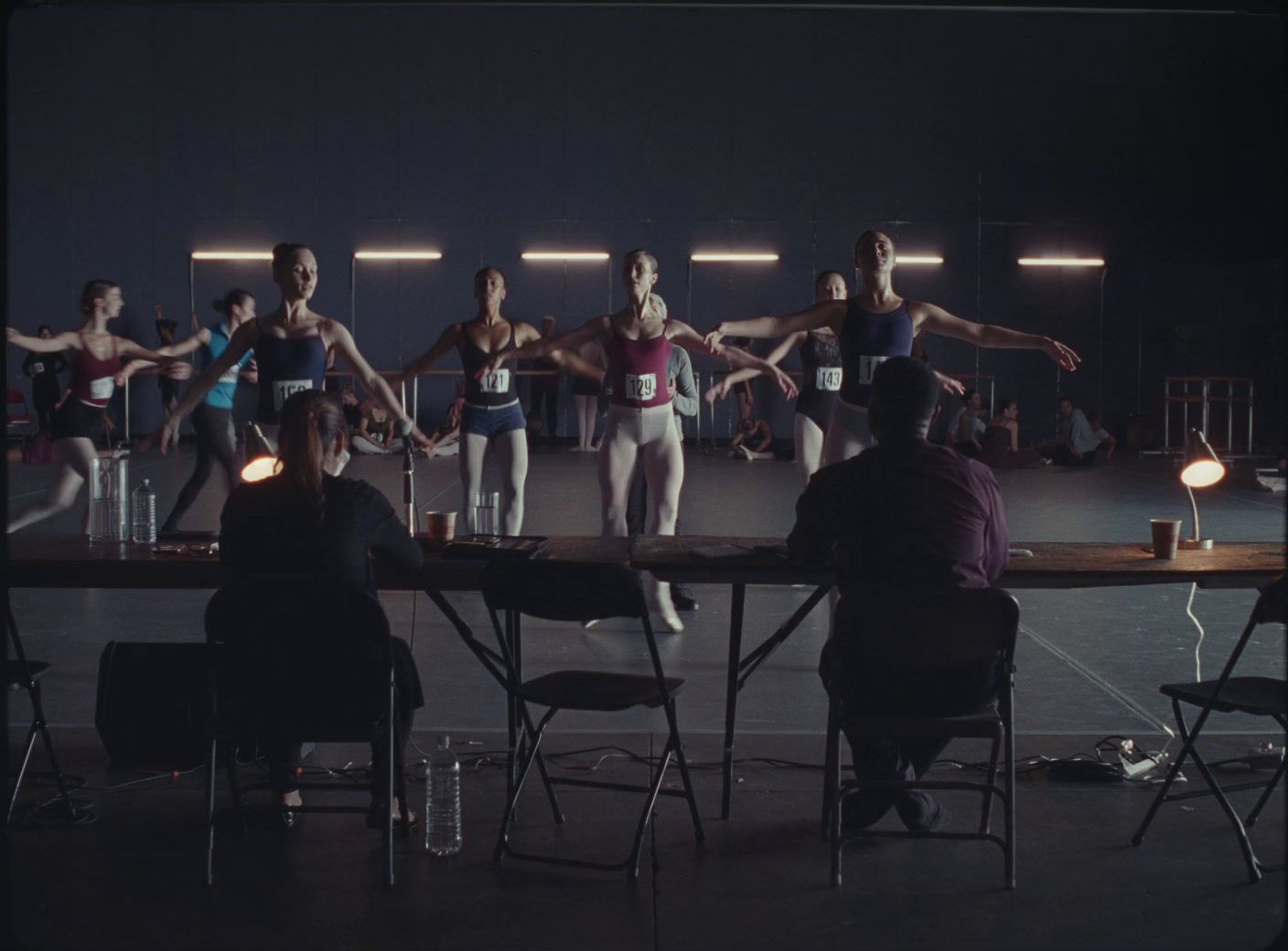 a group of people sitting around a table