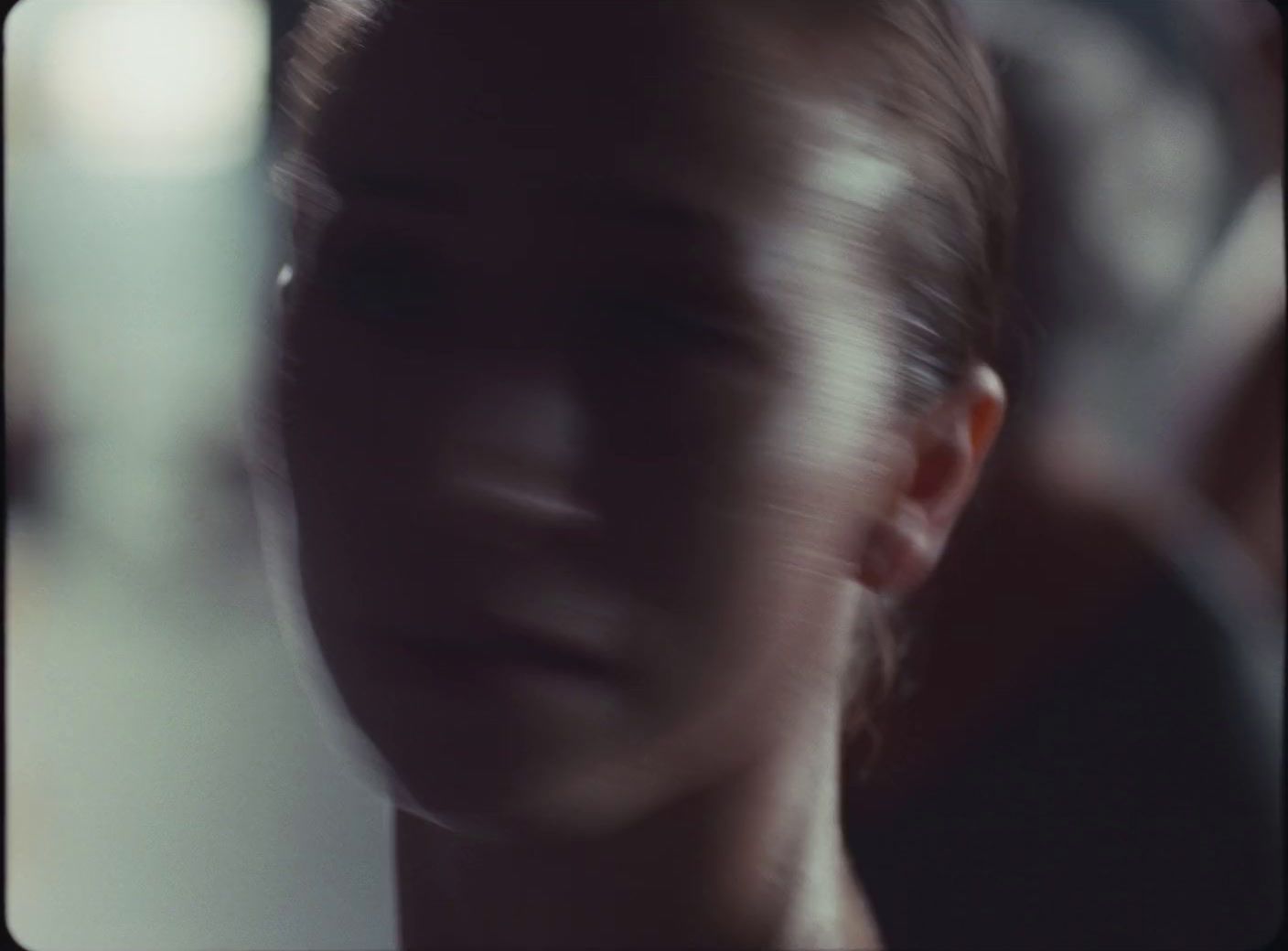 a blurry photo of a woman's face