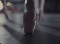 a close up of a person's feet on a table