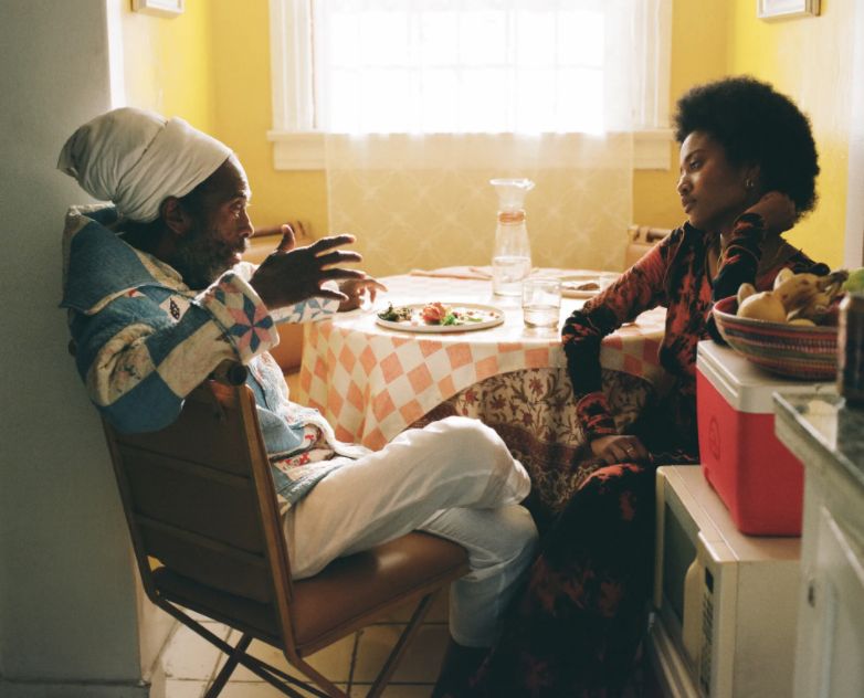 a couple of people sitting at a table