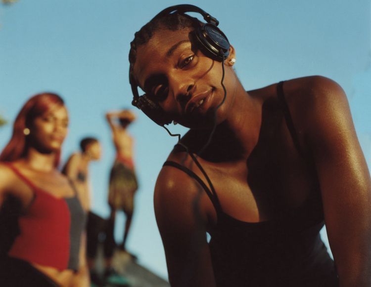 a group of women standing next to each other