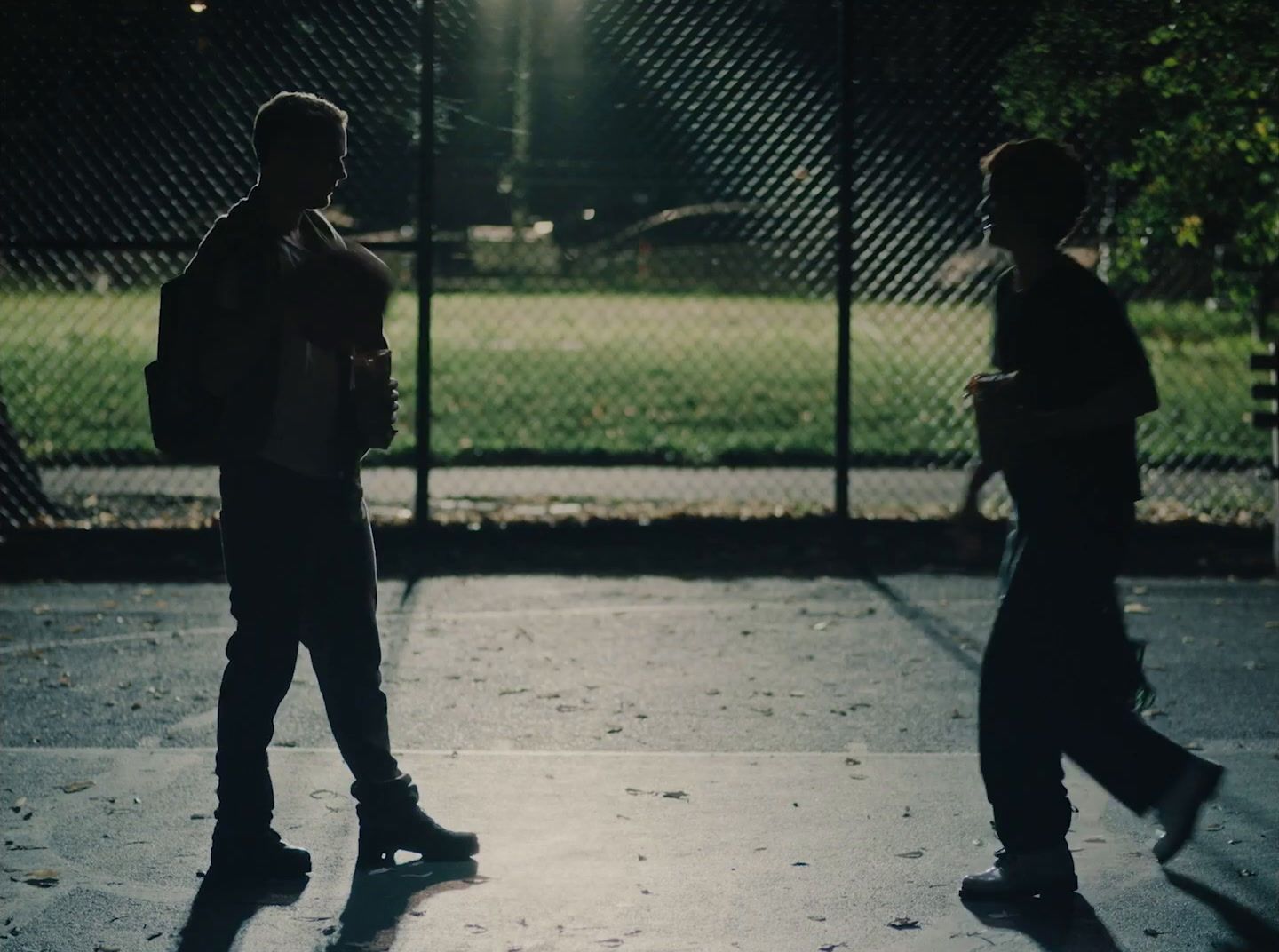 a couple of people that are standing in the street